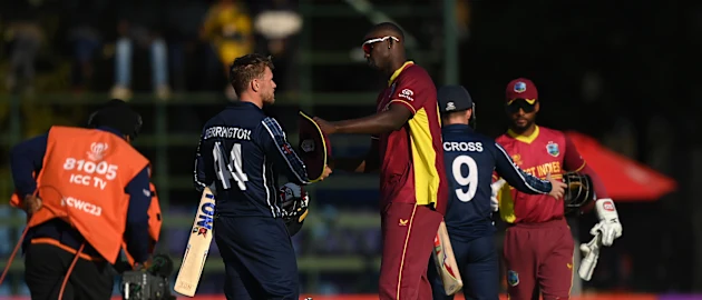 Richie Berrington of Scotland and Jason Holder of West Indies shake hands following the ICC Men's Cricket World Cup Qualifier Zimbabwe 2023 Super 6 match between Scotland and West Indies at Harare Sports Club on July 01, 2023 in Harare, Zimbabwe.