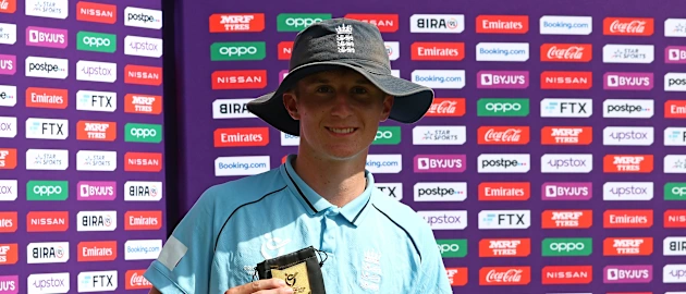 Joshua Boyden of England poses for a picture with his player of the match award following  the ICC U19 Men's Cricket World Cup match between Bangladesh and England at Warner Park Sporting Complex on January 16, 2022 in Basseterre, Saint Kitts and Nevis.