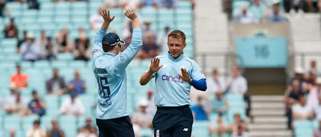 Eoin Morgan and Sam Curran