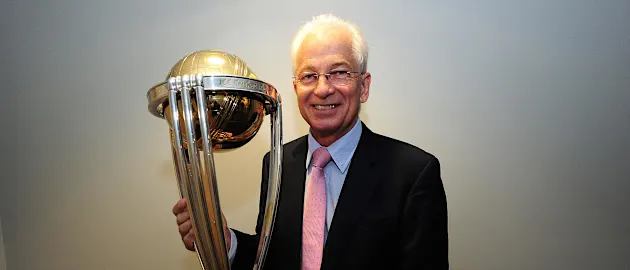 Former England Cricket Captain, David Gower poses with the ICC Cricket World Cup Trophy during the England v India One Day International at The County Ground on August 25, 2014 in Bristol, England
