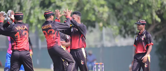 Norman Vanua celebrates the wicket of Kamau Leverock, 2nd of the hat-trick.