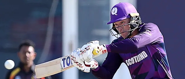 Richie Berrington plays a shot during the ICC mens Twenty20 World Cup cricket match between Scotland and Papua New Guinea at the Oman Cricket Academy Ground in Muscat on October 19, 2021.