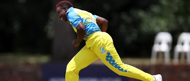 Henriette Ishimwe of Rwanda celebrates the wicket of Faith Ndhlalambi of Zimbabwe during the ICC Women's U19 T20 World Cup 2023 match between Zimbabwe and Rwanda at North-West University Oval on January 17, 2023 in Potchefstroom, South Africa.