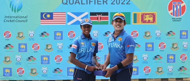 Chamari Athapaththu of Sri Lanka hands over her Player of the Match to Sachini Nisansala