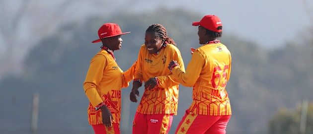Adel Zimunu of Zimbabwe celebrates with teammates 