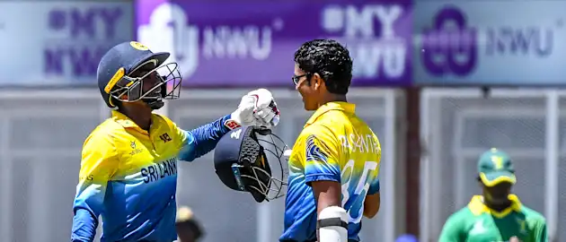 Ravindu Rashantha of Sri Lanka celebrates a century during the ICC U19 Cricket World Cup Plate Quarter Final 1 match between Sri Lanka and Nigeria at Ibbies Oval on January 27, 2020 in Potchefstroom, South Africa.