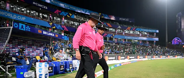 Umpires Richard Illingworth and Shahid Saikat walk onto the field during the ICC Men's Cricket World Cup India 2023 between South Africa and Sri Lanka at Arun Jaitley Stadium on October 07, 2023 in Delhi, India.