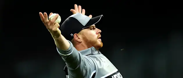 Glenn Phillips of New Zealand celebrates catching out Marcus Stoinis of Australia during the ICC Men's T20 World Cup match between Australia and New Zealand