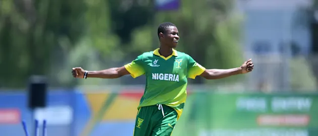 Ifeanyichukwu Uboh of Nigeria celebrates the wicket of Sora Ichiki of Japan during the ICC U19 Cricket World Cup 15th Place Play-Off match between Nigeria and Japan at Ibbies Oval on February 1, 2020 in Potchefstroom, South Africa.