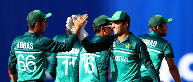 Players of Pakistan celebrate following the 5th/6th Playoff match between Sri Lanka and Pakistan at Sir Vivian Richards Stadium on February 03, 2022 in Antigua, Antigua and Barbuda.