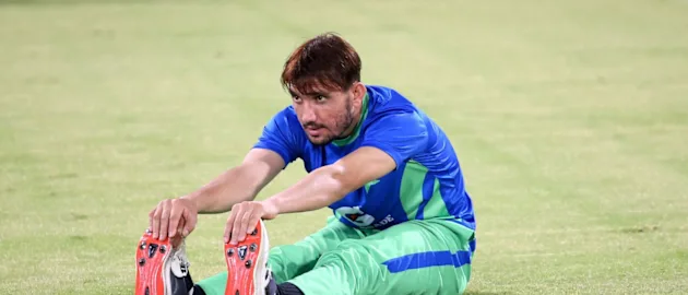 Zaman Khan limbers up ahead of a practice session // Pakistan Cricket Board