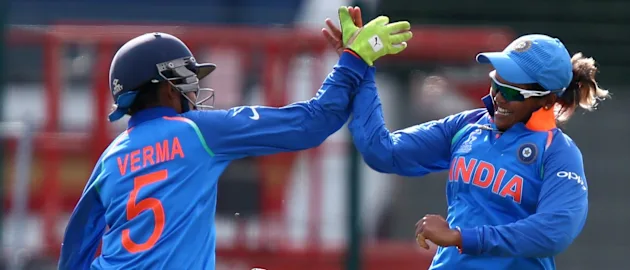India wicketkeeper Sushma Verma celebrates with substitute fielder Veda who caught the catch to end the match during the ICC Women's World Cup match between England and India