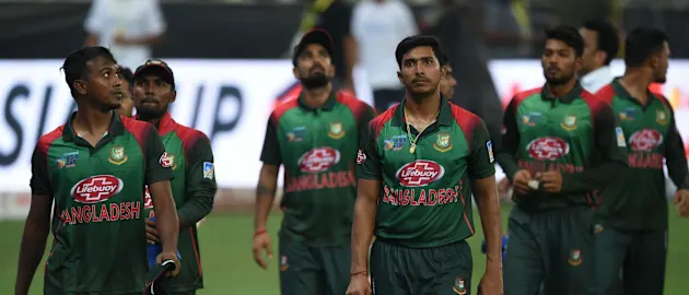 The dejected Bangladeshis after losing the Asia Cup final to India off the last ball