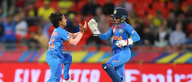 Poonam Yadav of India celebrates with Taniya Bhatia of India after dismissing Ellyse Perry of Australia during the ICC Women's T20 Cricket World Cup match between Australia and India at Sydney Showground Stadium on February 21, 2020 in Sydney, Australia.
