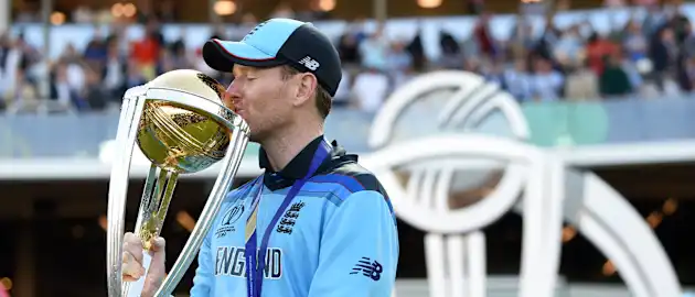 Eoin Morgan of England lifts the Cricket World Cup Trophy