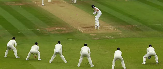 Broad bowling to a packed slip cordon