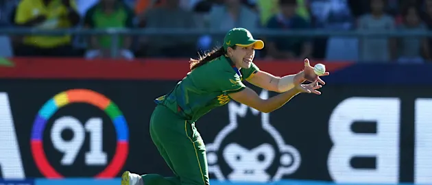 Tazmin Brits of South Africa takes a catch to dismiss Danni Wyatt of England during the ICC Women's T20 World Cup Semi Final match between England and South Africa at Newlands Stadium on February 24, 2023 in Cape Town, South Africa.
