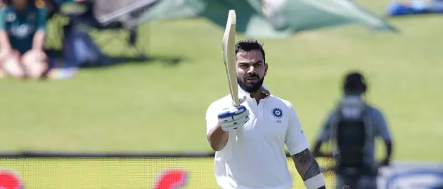 Virat Kohli celebrates his 150 against South Africa on day three