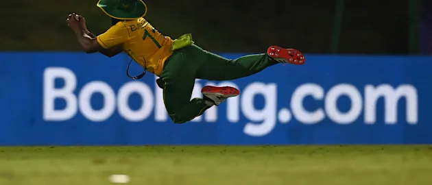 Temba Bavuma of South Africa catches out Mohammad Hafeez of Pakistan during the Pakistan and South Africa warm Up Match prior to the ICC Men's T20 World Cup at on October 20, 2021 in Abu Dhabi, United Arab Emirates.