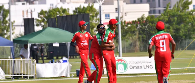 Oman players celebrating