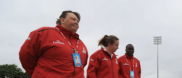Umpires Sue Redfern, Claire Polosak and Langton Rusere form part of the 14-member officiating team
