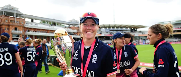 Anya Shrubsole poses with the trophy.