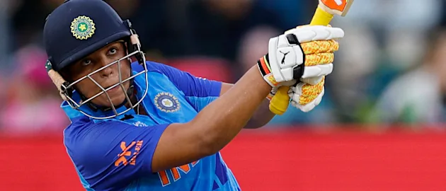 India's Richa Ghosh hits a six during the Group B T20 women's World Cup cricket match between England and India at St George's Park in Gqeberha on February 18, 2023.