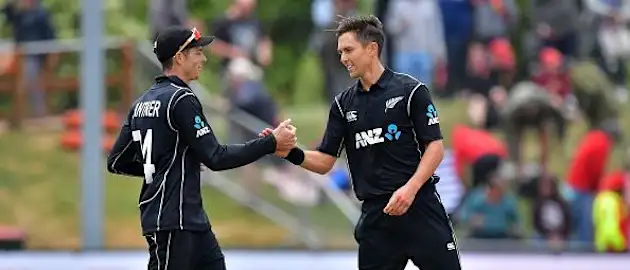 Trent Boult (right) with Mitchell Santner