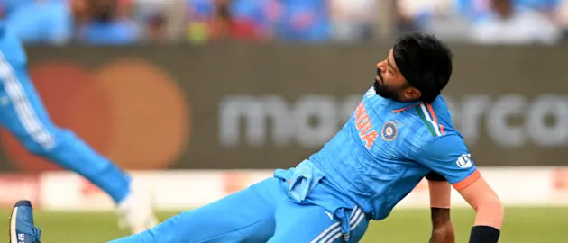Hardik Pandya of India reacts in their follow through after bowling during the ICC Men's Cricket World Cup India 2023 between India and Bangladesh (2)
