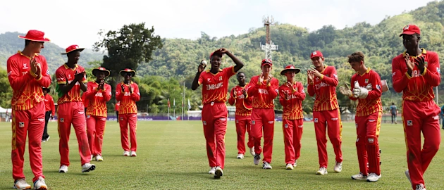 Alex Falao of Zimbabwe leads their side off after taking five wickets during the ICC U19 Men's Cricket World Cup match between Pakistan and Zimbabwe.