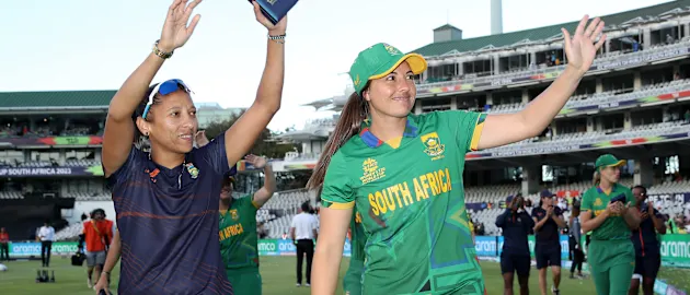Shabnim Ismail and Sune Luus of South Africa interacts with the crowd following the ICC Women's T20 World Cup Final match between Australia and South Africa at Newlands Stadium on February 26, 2023 in Cape Town, South Africa.