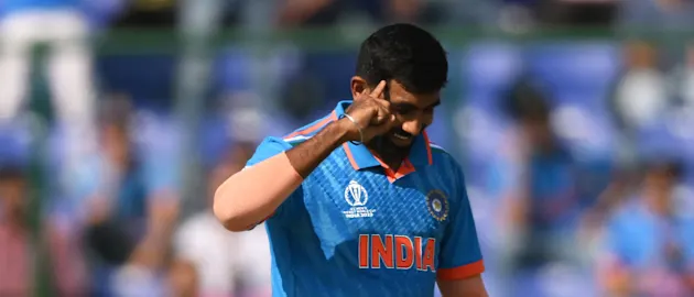 Jasprit Bumrah of India celebrates the wicket of Ibrahim Zadran of Afghanistan during the ICC Men's Cricket World Cup India 2023 between India and Afghanistan