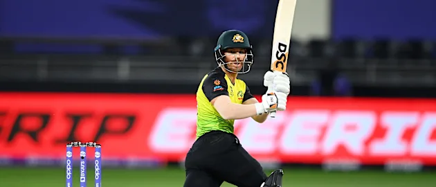 David Warner of Australia plays a shot during the ICC Men's T20 World Cup match between Australia and Sri Lanka at Dubai International Stadium on October 28, 2021 in Dubai, United Arab Emirates.