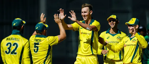 Billy Stanlake (centre) picked up four wickets for eight runs