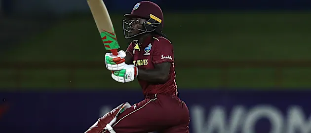 Deandra Dottin of Windies hits a six during the ICC Women's World T20 2018 match between Windies and England at Darren Sammy Cricket Ground on November 18, 2018 in Gros Islet, Saint Lucia.