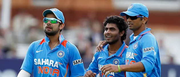 Kohli (left), Ravindra Jadeja (centre) and Dravid (right) during an ODI against England in 2011 // Getty Images