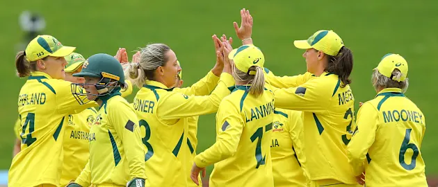 Ashleigh Gardner (3L) of Australia celebrates with teammates