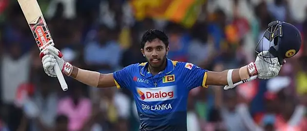 Kusal Mendis celebrates reaching his century off 102 balls and was dismissed by Taskin Ahmed for 102