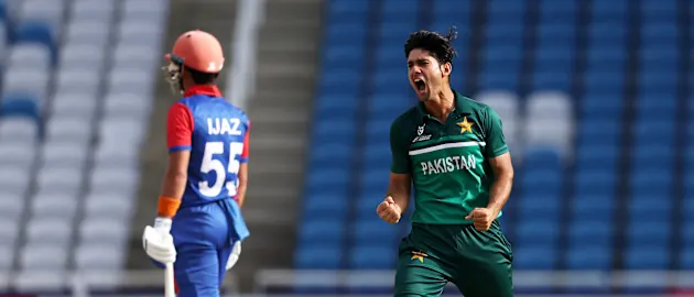 Qasim Akram of Pakistan celebrates the wicket of Khyber Wali of Afghanistan.