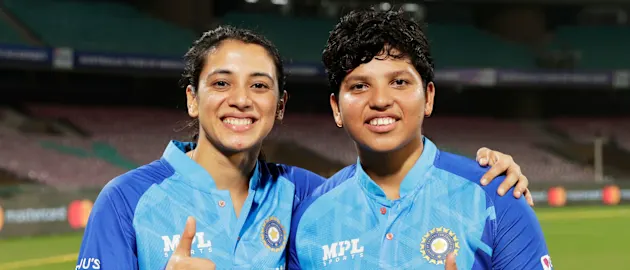 Smriti Mandhana (left) and Richa Ghosh after India's victory over Australia