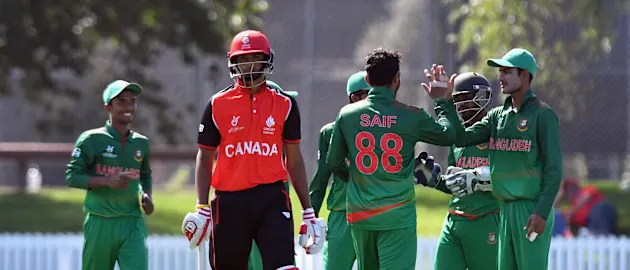 Akash Gill of Canada looks dejected after being dismissed by Mohammed Saif Hassan of Bangladesh