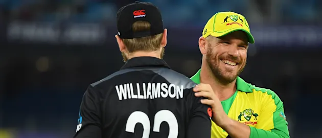 Kane Williamson of New Zealand interacts with Aaron Finch of Australia during the ICC Men's T20 World Cup final match between New Zealand and Australia