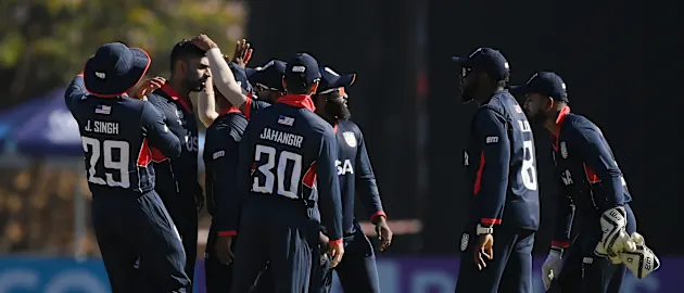 USA players celebrate after a wicket