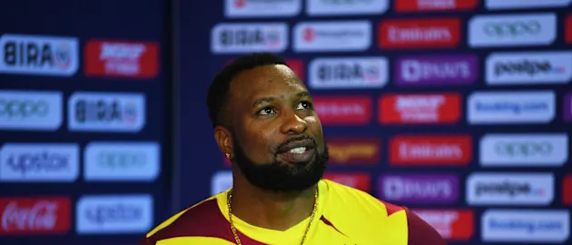 Kieron Pollard of West Indies looks on as they are interviewed following the ICC Men's T20 World Cup match between West Indies and Sri Lanka at Sheikh Zayed stadium on November 04, 2021 in Abu Dhabi, United Arab Emirates.