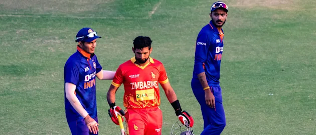 Sikandar Raza congratulated by India players after a starring knock in Harare.