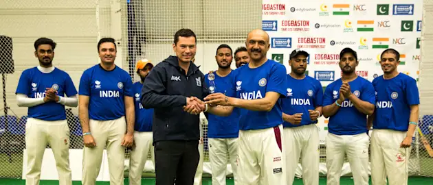 Pratap Odedra received the Edgbaston Fans T20 Trophy from Tom Rawlings
