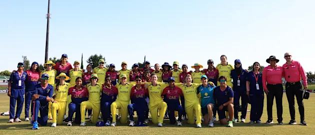 Players and Staff of Australia and UAE pose for a photo alongside the Match Officials following the ICC Women's U19 T20 World Cup 2023 Super 6 match between UAE and Australia at JB Marks Oval on January 23, 2023.
