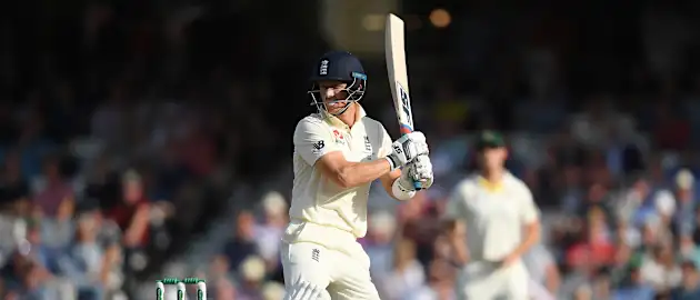 Joe Denly plays behind square during his 94