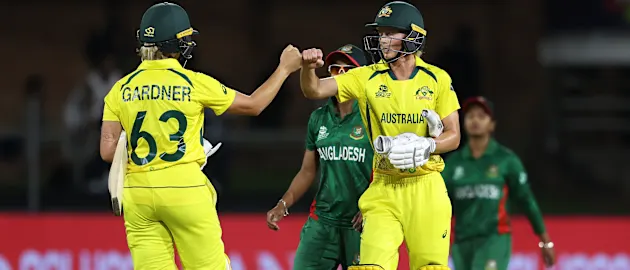 Ashleigh Gardner and Meg Lanning of Australia celebrate following the ICC Women's T20 World Cup group A match between Australia and Bangladesh at St George's Park on February 14, 2023 in Gqeberha, South Africa.
