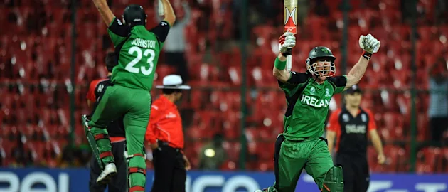 61023 Ireland cricketers Trent Johnston (L) an